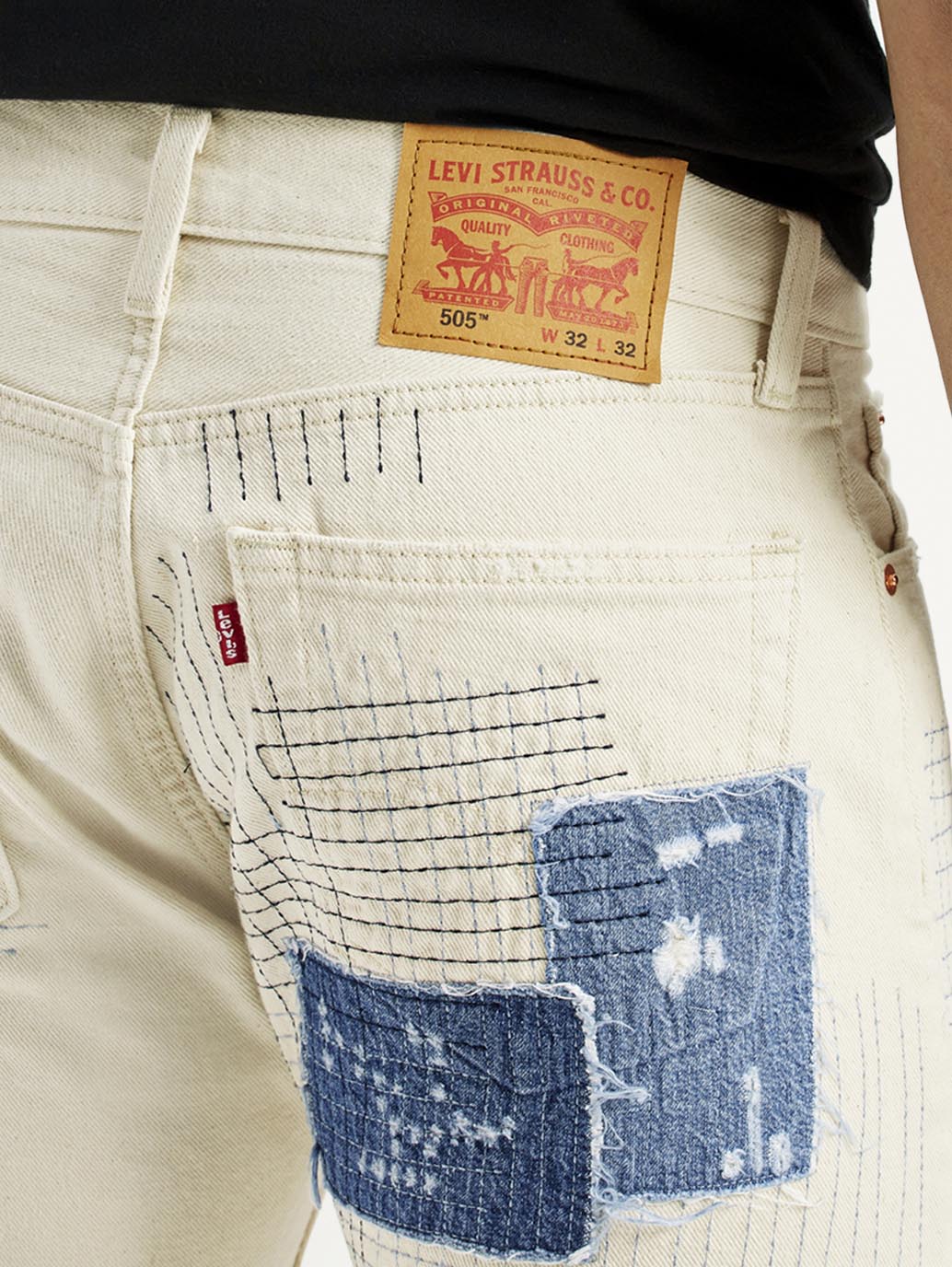 Men's 555 Off White Loose Fit Mid Rise Jeans