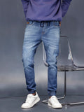 Men’s light washed jogger fit jeans | Med Stone