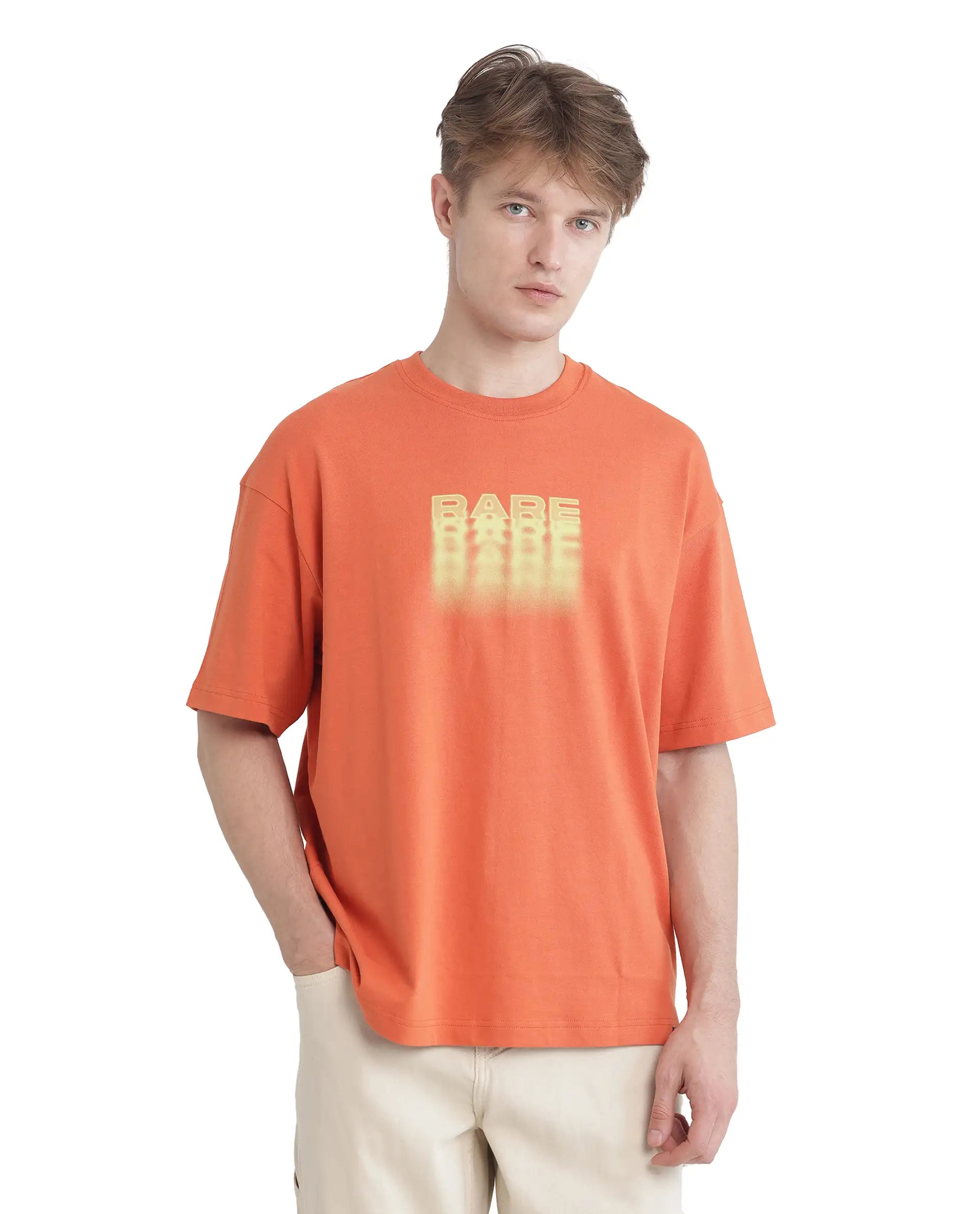 Rare Rabbit Men's Act Orange Cotton Graphic Print Oversized Fit Half Sleeve Crew Neck T-Shirt