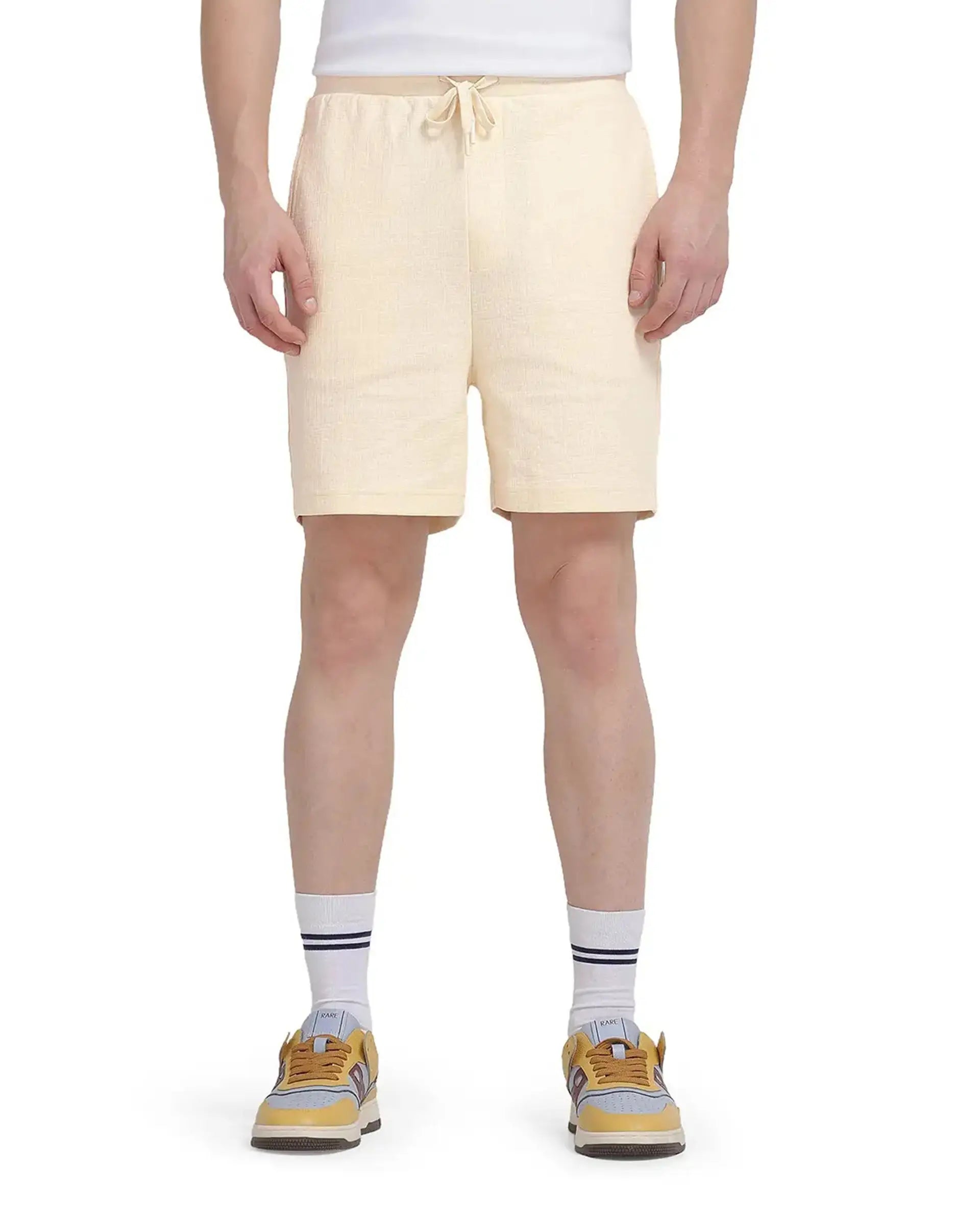 Rare Rabbit Men's Kelor Pastel Yellow Cotton Blend Plain Regular Fit Shorts