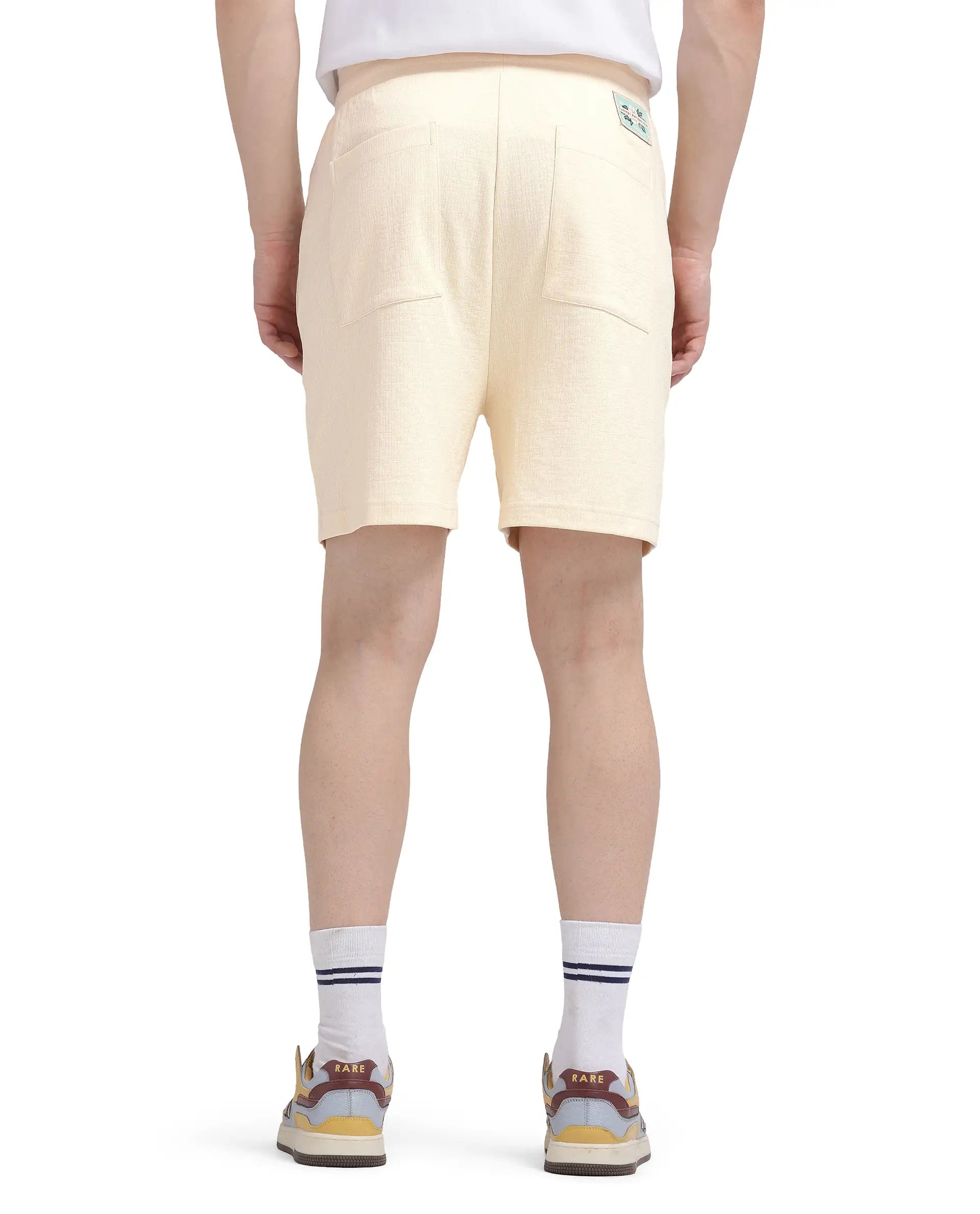 Rare Rabbit Men's Kelor Pastel Yellow Cotton Blend Plain Regular Fit Shorts