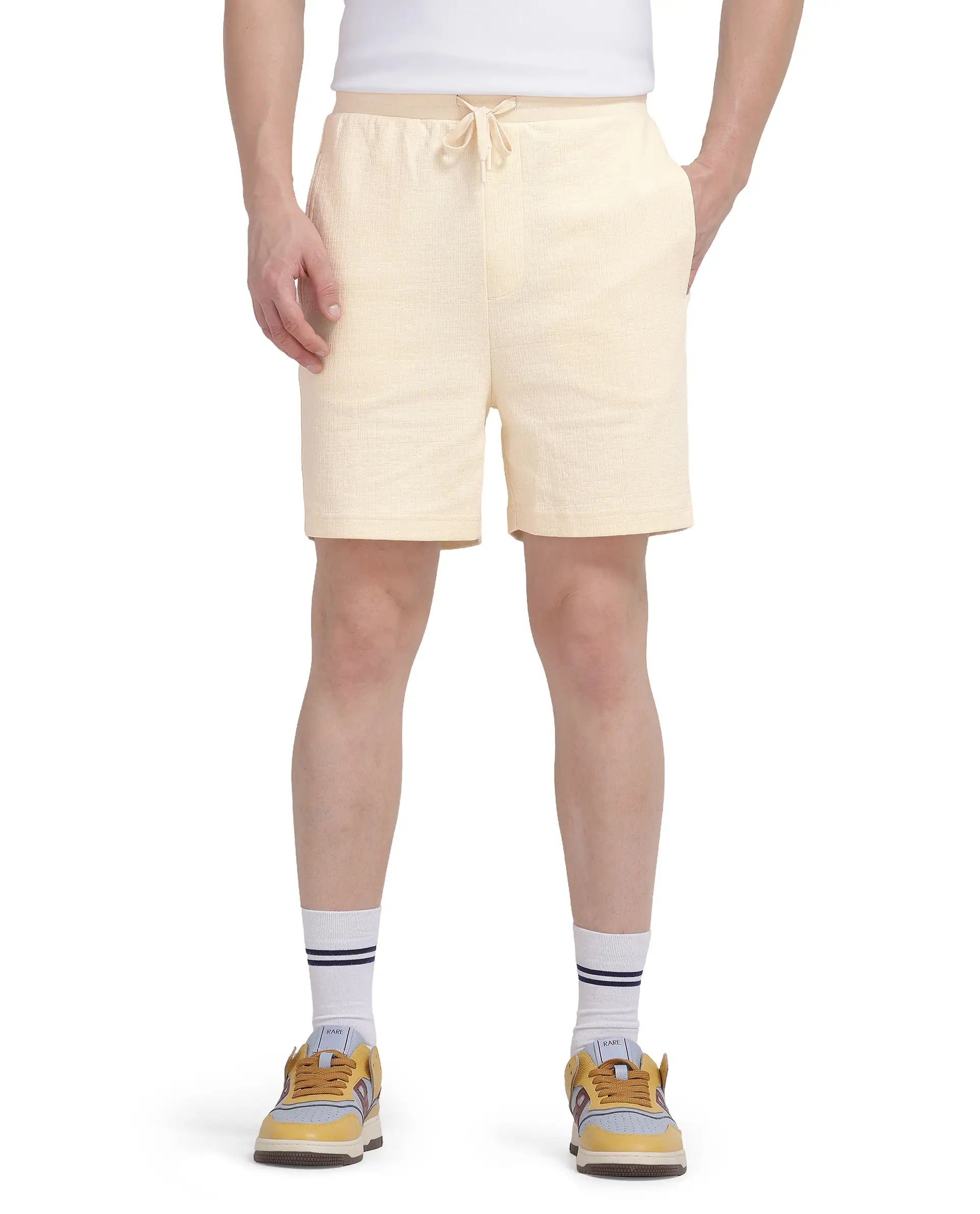 Rare Rabbit Men's Kelor Pastel Yellow Cotton Blend Plain Regular Fit Shorts