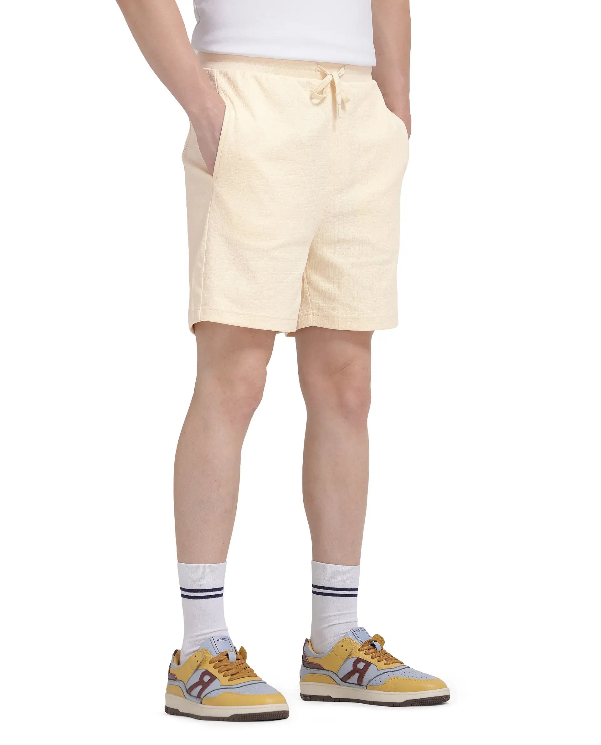 Rare Rabbit Men's Kelor Pastel Yellow Cotton Blend Plain Regular Fit Shorts