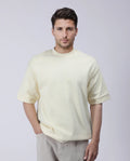 Rare Rabbit Men's Lauch Pastel Yellow Cotton Blend Plain Oversized Fit Half Sleeve Crew Neck T-Shirt